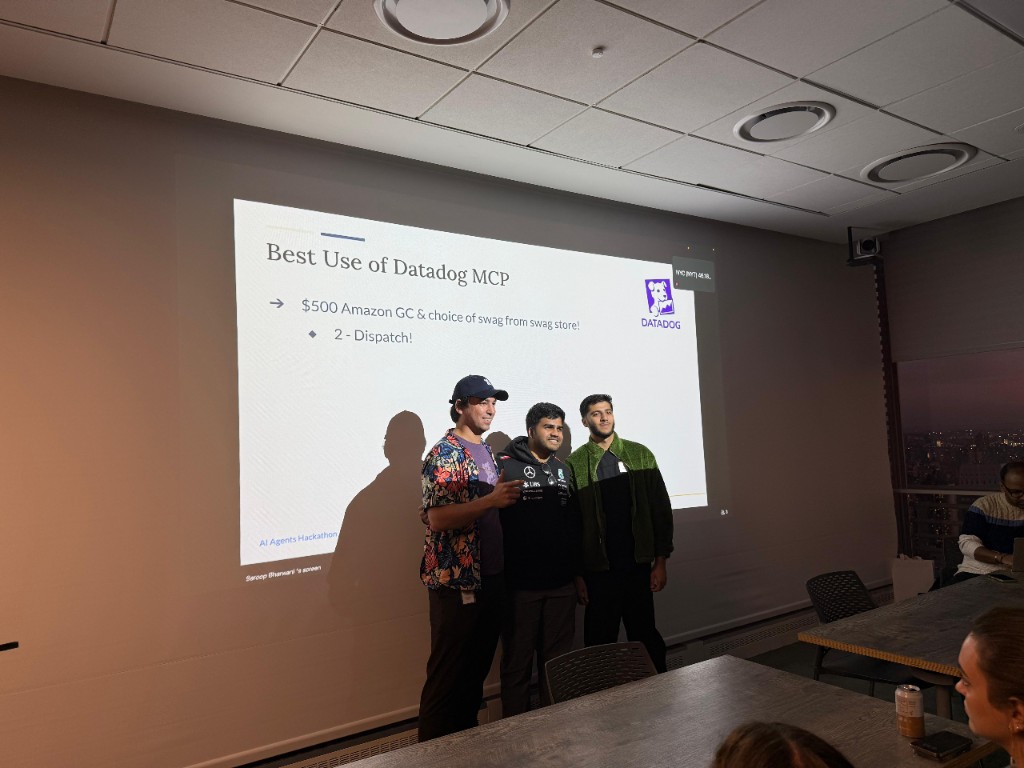 The Dispatch team accepting the Best Use of Datadog MCP award